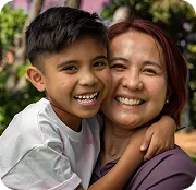 Transplant recipient with child smiling